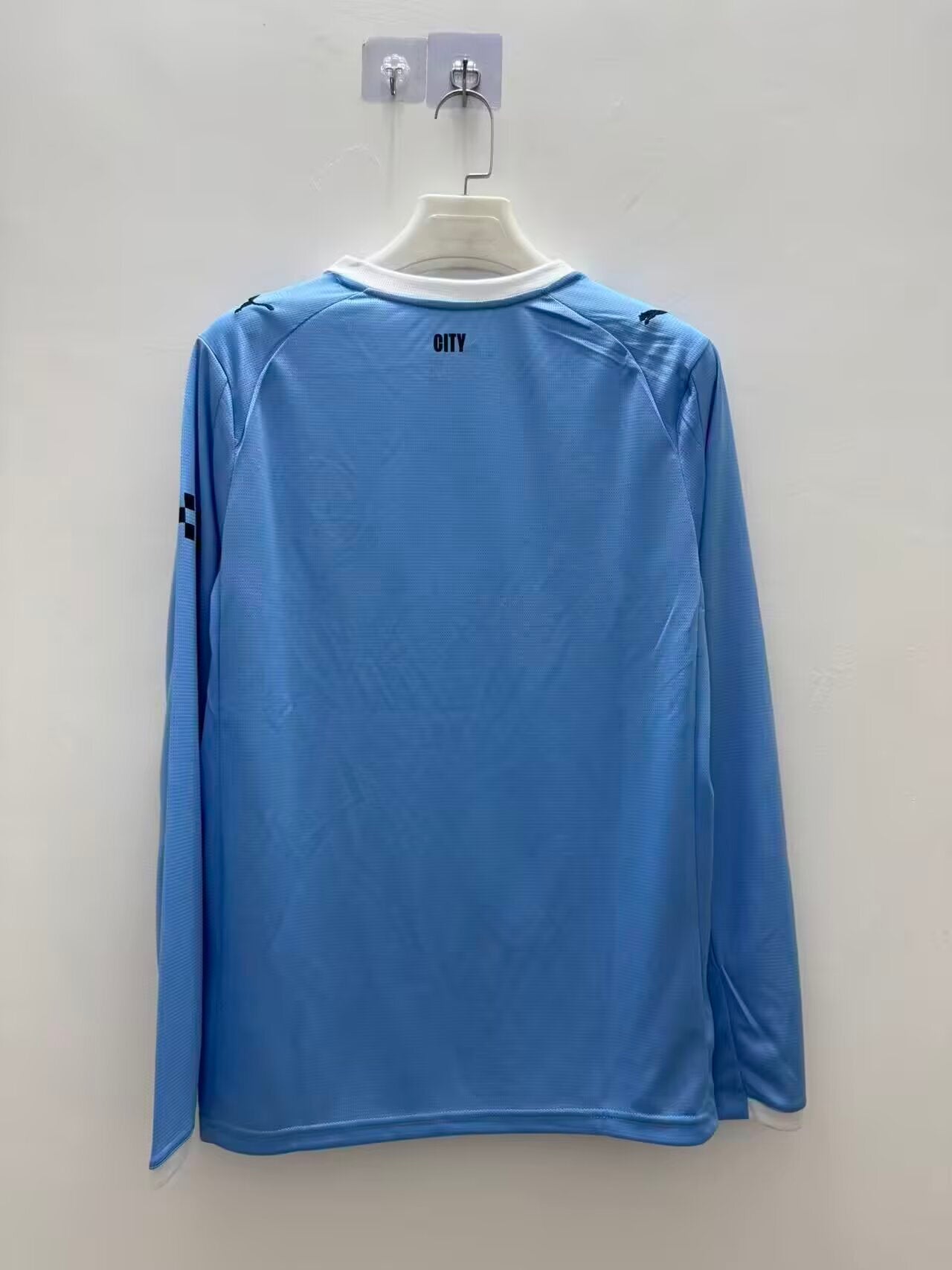 Manchester City Local 25/26 Manga Larga Fan