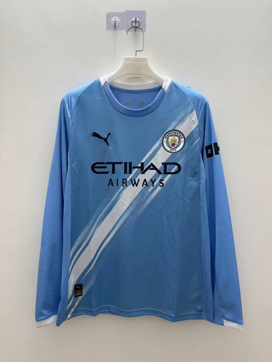 Manchester City Local 25/26 Manga Larga Fan